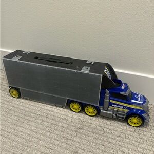 Blue and Silver Police Toy Truck